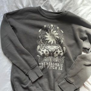 Abercrombie and Fitch sweater with mushroom, Sun , and butterflies design